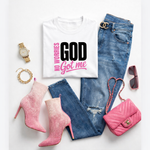 White t-shirt with 'GOD GOT ME' text, blue jeans, pink boots, pink handbag, sunglasses, and watch on a white background