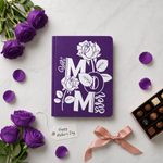 Purple notebook with floral design and text, surrounded by purple roses and chocolates on a white background.