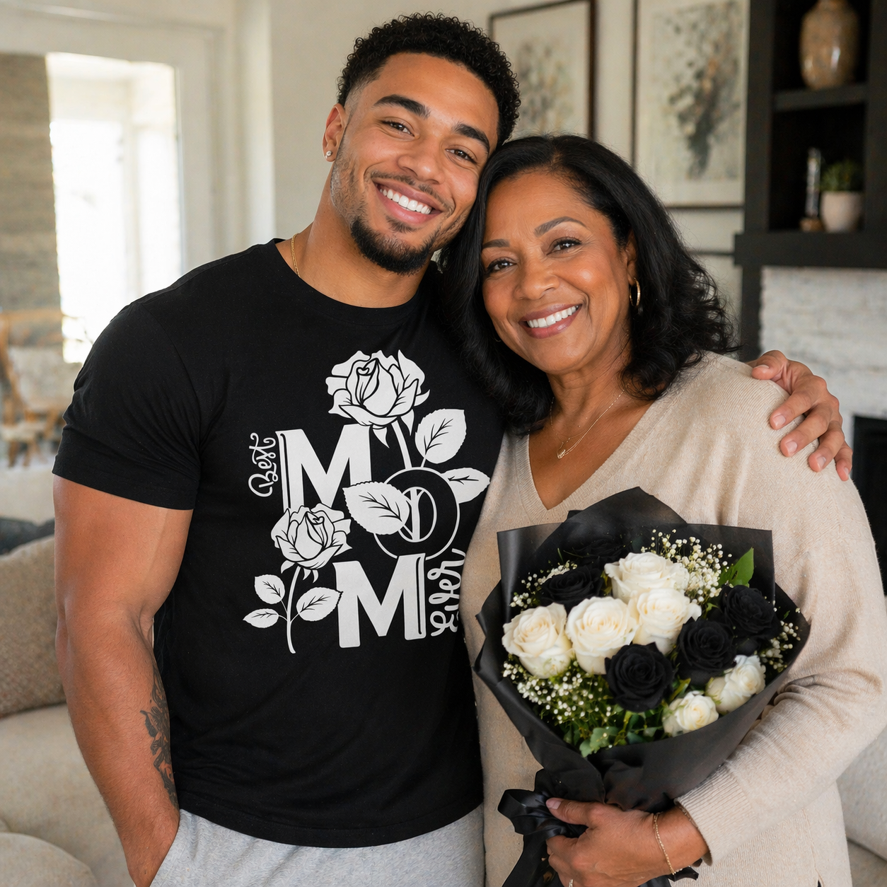 Man wearing a black t-shirt with 'Mom' design, standing next to a woman holding flowers.