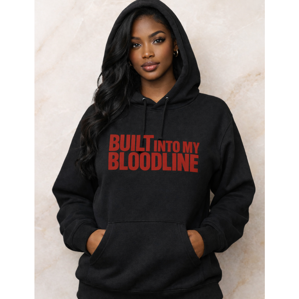 Person wearing a black hoodie with 'BUILT INTO MY BLOODLINE' text in red.