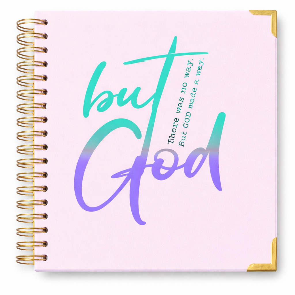 Notebook with 'but God' text on a pink cover