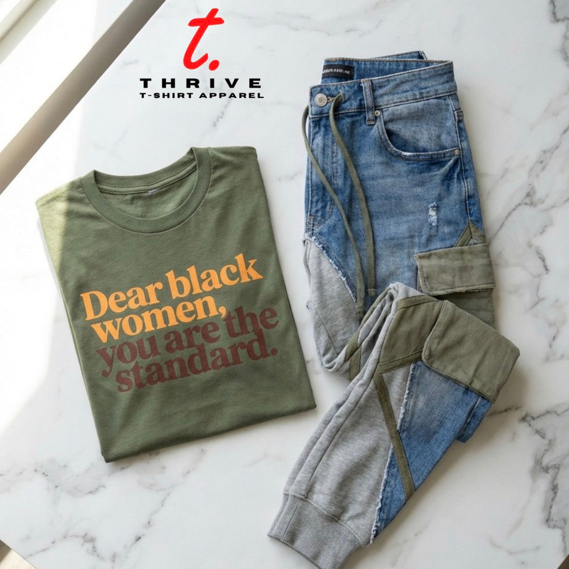 Green t-shirt with text and jeans on a marble surface with 'Thrive T-Shirt Apparel' branding.