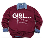 A maroon crewneck sweatshirt featuring a white graphic print that reads 'GIRL.