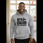 Man wearing a gray hoodie with 'My Faith Will Not Waiver' text in a home setting.