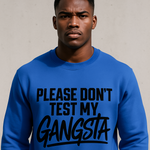 Man wearing a blue sweatshirt with text 'PLEASE DON'T TEST MY GANGSTA' on a plain background