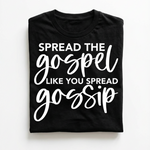Black t-shirt with white text 'Spread the gospel like you spread gossip' on a white background