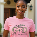Woman wearing a pink t-shirt with a motivational quote and design.