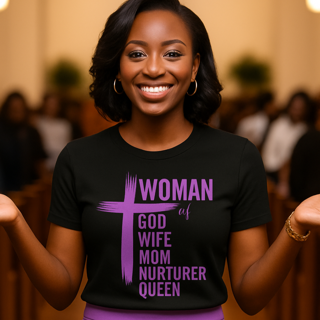 Woman wearing a black t-shirt with purple text and design, standing in a blurred indoor setting.