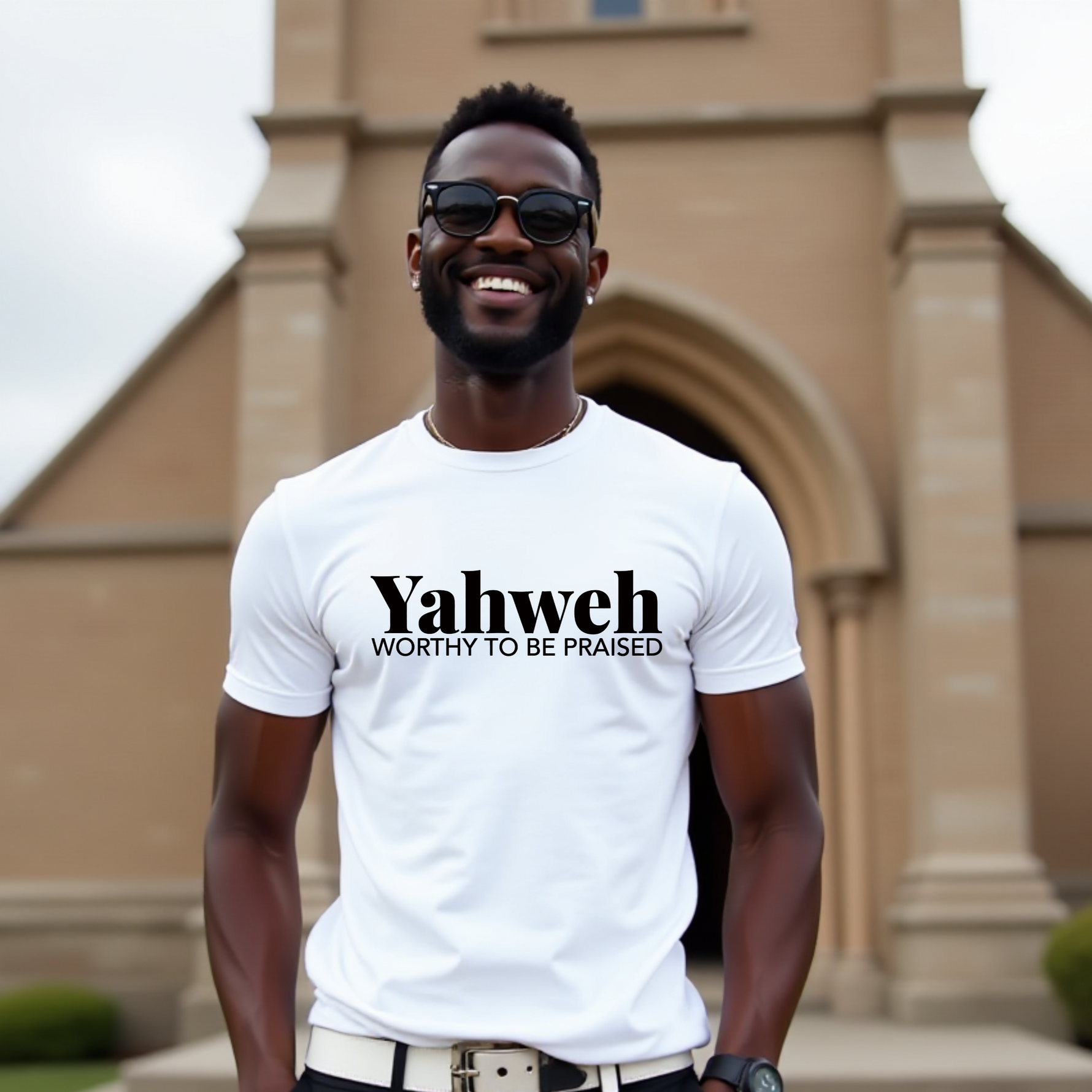 Man wearing a white t-shirt with 'Yahweh Worthy to be Praised' text in front of a CHURCH