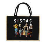 Black tote bag with 'SISTAS' text and illustrations of five women on a white background